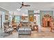 Relaxing living room with comfortable seating and natural light at 2532 Edenville Path, The Villages, FL 32162