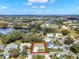 Desirable community aerial view, with beautiful lakes and landscaping, highlights the home's position in the neighborhood at 25941 Newcombe Cir, Leesburg, FL 34748