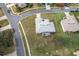 Single-story house with a screened lanai, seen from above at 27302 Orchid Glade St, Leesburg, FL 34748