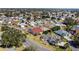 Aerial view of a residential neighborhood showcasing homes and landscaping at 2762 Morven Park Way, The Villages, FL 32162