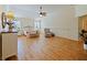 Large main bedroom with hardwood floors and ceiling fan at 2762 Morven Park Way, The Villages, FL 32162