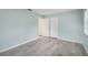 Empty bedroom with light walls and double doors at 312 Brigadoon Cir # 312, Leesburg, FL 34788