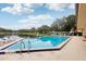 Relax by the refreshing community pool with lounge chairs at 312 Brigadoon Cir # 312, Leesburg, FL 34788