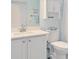 Small bathroom with white vanity and toilet at 3253 Archer Ave, The Villages, FL 32162