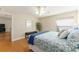 Bright bedroom with hardwood floors and a view of another room at 3488 Sterling St, The Villages, FL 32162