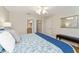 King-size bedroom with access to bathroom and walk-in closet at 3488 Sterling St, The Villages, FL 32162