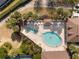 Resort-style pool with surrounding lounge area at 3488 Sterling St, The Villages, FL 32162