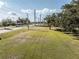 Large vacant lot with road frontage and grassy area at 3704 Warm Springs Ave, Wildwood, FL 34785