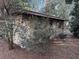 House exterior featuring stone and wood accents at 403 W Palm Ave, Bushnell, FL 33513