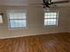 Living room with hardwood floors and neutral wall colors at 403 W Palm Ave, Bushnell, FL 33513