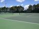 Two tennis courts available for residents at 4077 Greystone Dr, Clermont, FL 34711