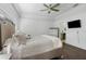 Bright bedroom with a ceiling fan and large bed at 415 Renee Dr, Haines City, FL 33844