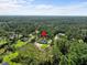 Aerial view of property, showcasing its location and surrounding landscape at 42025 Royal Trails Rd, Eustis, FL 32736