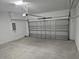 Attached garage with an automatic garage door opener at 42025 Royal Trails Rd, Eustis, FL 32736