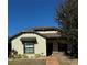 Charming single-story home with a well-manicured lawn and brick walkway leading to the front door at 4556 Water Oak Ter, Oxford, FL 34484