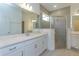 Bathroom with white cabinets, quartz countertop, and a walk-in shower at 5119 Firebush Dr, Apopka, FL 32712