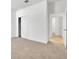 Bedroom view featuring open doors and closet at 5119 Firebush Dr, Apopka, FL 32712