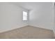 Cozy bedroom with carpeted floor and a window at 5119 Firebush Dr, Apopka, FL 32712