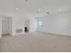 Large bonus room featuring carpet and doors leading to other rooms at 5119 Firebush Dr, Apopka, FL 32712