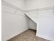 Walk-in closet includes wire shelving and carpeted floor at 5119 Firebush Dr, Apopka, FL 32712