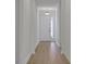 Bright entryway with light-toned wood flooring offers a welcoming entrance into the home at 5119 Firebush Dr, Apopka, FL 32712