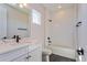 Clean bathroom, featuring white subway tiles and a modern vanity at 5155 Firebrush Dr, Apopka, FL 32712