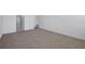 Cozy bedroom with plush carpeting and view of open doorway at 5155 Firebush Dr, Apopka, FL 32712
