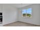 Dining room with natural light, wood floors, and modern chandelier at 5155 Firebush Dr, Apopka, FL 32712