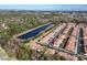 Aerial view of community with lake and townhouses at 5448 Via Appia Way, Sanford, FL 32771