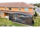 Aerial view showing the house's back and screened patio at 5448 Via Appia Way, Sanford, FL 32771