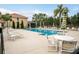 Community pool with lounge chairs and patio tables at 5448 Via Appia Way, Sanford, FL 32771