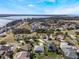 Aerial view of community near the water at 5502 Bounty Cir, Tavares, FL 32778