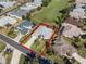 Aerial view of house and surrounding community at 5502 Bounty Cir, Tavares, FL 32778