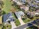 Aerial view of homes and surrounding landscape at 5502 Bounty Cir, Tavares, FL 32778