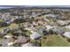 Aerial view of neighborhood with water access at 5502 Bounty Cir, Tavares, FL 32778