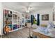 Bedroom with built-in shelving and a daybed at 5502 Bounty Cir, Tavares, FL 32778