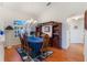 Formal dining room with hardwood floors, chandelier, and built-in hutch at 5502 Bounty Cir, Tavares, FL 32778