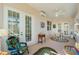 Relaxing sunroom featuring ample natural light and seating at 5502 Bounty Cir, Tavares, FL 32778