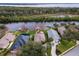 Waterfront homes with boat docks, showcasing desirable location and views at 6216 Landings Blvd, Lady Lake, FL 32159