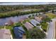 Aerial view of waterfront home and community at 6216 Landings Blvd, Lady Lake, FL 32159