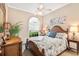 Spacious bedroom with a king-size bed and decorative artwork at 6216 Landings Blvd, Lady Lake, FL 32159