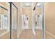 Large walk-in closet with mirrored doors at 6216 Landings Blvd, Lady Lake, FL 32159