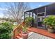 Spacious deck with stairs leading to the backyard at 6216 Landings Blvd, Lady Lake, FL 32159