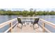 Private dock with seating, perfect for relaxing by the water at 6216 Landings Blvd, Lady Lake, FL 32159