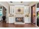 Built-in white cabinets flank a fireplace at 6216 Landings Blvd, Lady Lake, FL 32159