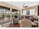 Gathering room with view of backyard and screened porch at 6216 Landings Blvd, Lady Lake, FL 32159