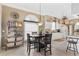 Bright kitchen with breakfast nook and white cabinets at 6216 Landings Blvd, Lady Lake, FL 32159