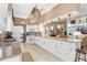 Spacious kitchen featuring granite counters and white cabinets at 6216 Landings Blvd, Lady Lake, FL 32159