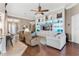 Bright living room features hardwood floors and built-in shelving at 6216 Landings Blvd, Lady Lake, FL 32159