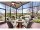 Relaxing screened porch with fire pit and water views at 6216 Landings Blvd, Lady Lake, FL 32159